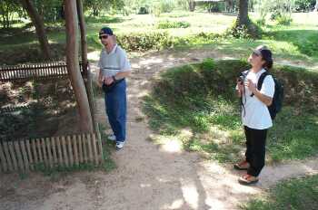 Standing among the mass graves of the Killing Fields in Cambodia