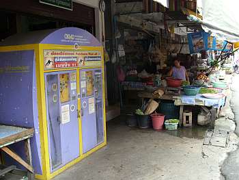 Mini gas pump in Bangkok neighborhood