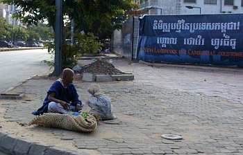 Old man on a street corner