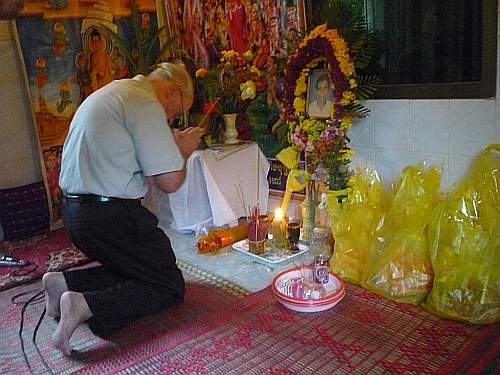 Offering incense at a funeral