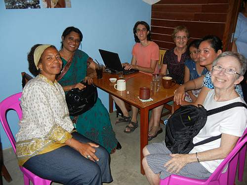 A table of Maryknoll people