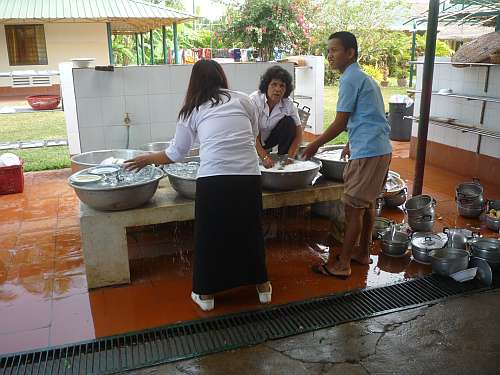 Washing the students' dishes