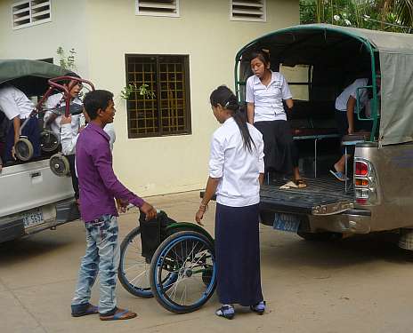 Climbing into vans to go to school