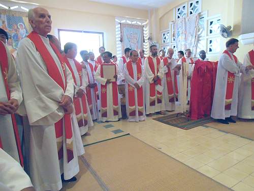 Priests in vesting room before ceremony