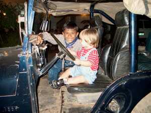 Seyha and Gus in the jeep