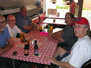 Lost Boys of St. Thomas gathered at Queenie's