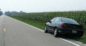 My car and a lot of corn in Illinois