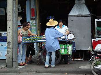 A vendor takes the entire sidewalk