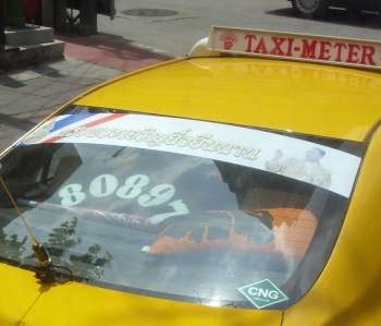 Taxi sticker supporting the king
