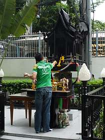 Making an offering at a shrine