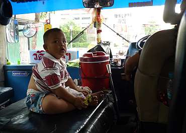 Child riding in bus