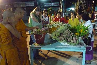 buying flowers at the wat