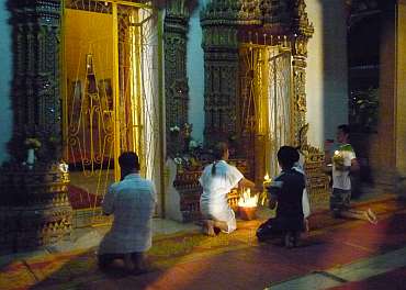 A family making offerings