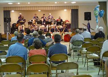 A full orchestra playing 1940s music