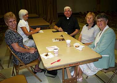 Fr. Carini with parishioners