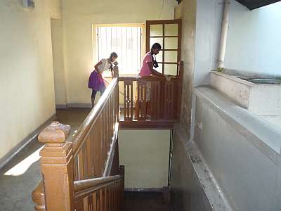 Cleaning an upstairs corridor