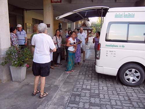 Vans leaving the retreat center