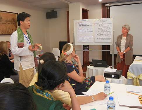 Chanthea explaining Caritas Australia policy