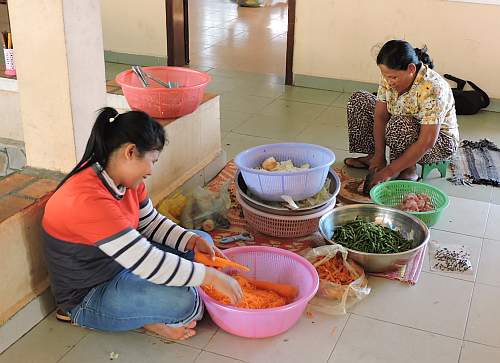 Kitchen workers preparing lunch
