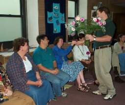 Mothers receiving flowers