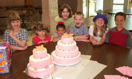 Nieces and nephews with the birthday cakes