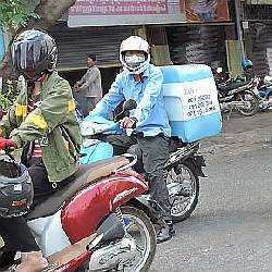 Motorcycle Delivery – Welcome to Cambodia, and…..